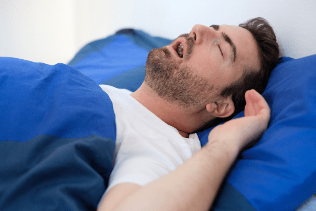 Man sleeping with open mouth and has dry mouth from snoring