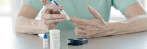 Diabetic person testing their blood sugar