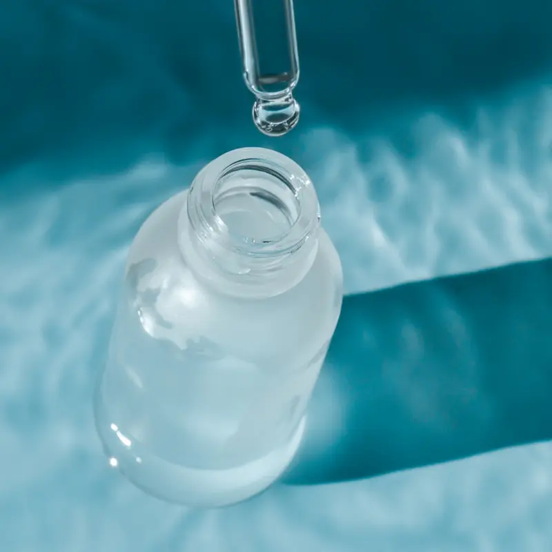 A glass bottle and dropper containing Hyaluronic Acid.