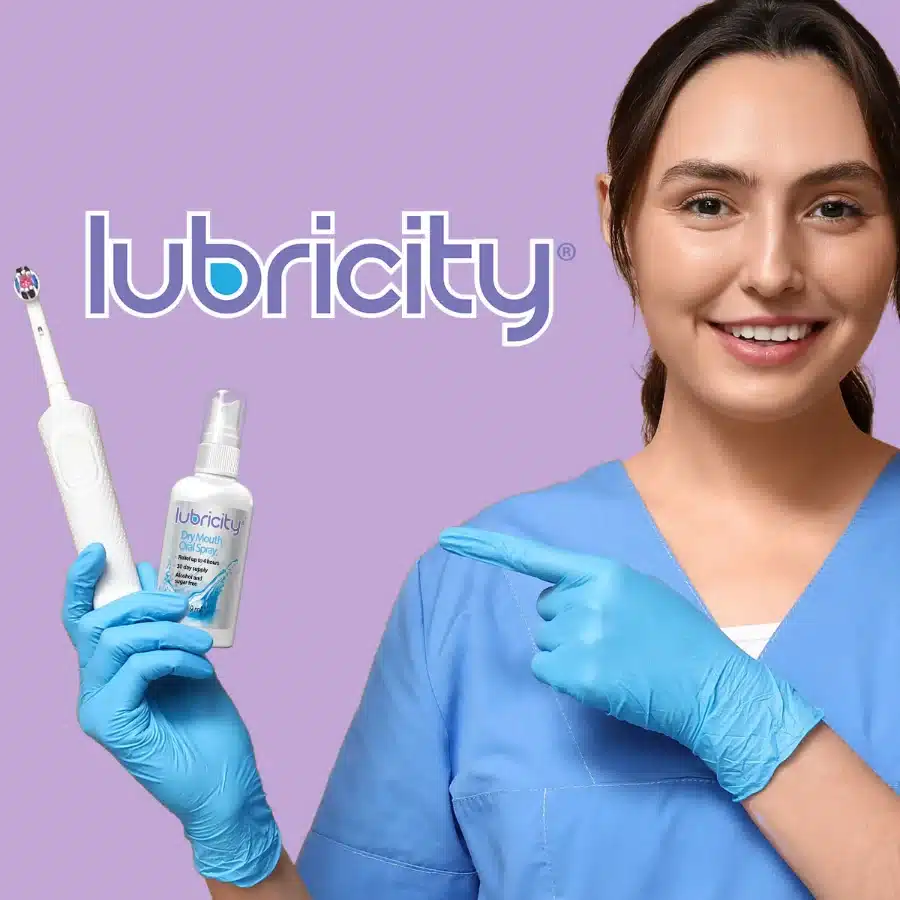A dentist recommending Lubricity as it contains Hyaluronic Acid as an effective method for getting relief from dry mouth symptoms.