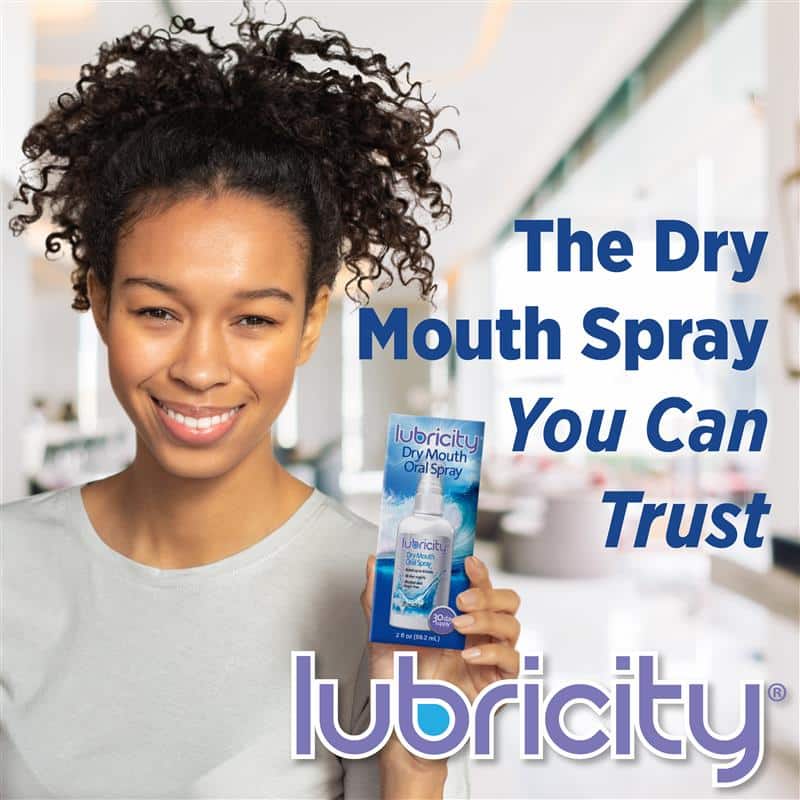 A woman holding a bottle of Lubricity with text on the image “The Dry Mouth Spray You Can Trust