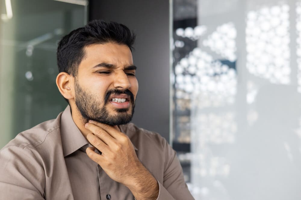 A man with diabetes experiencing dry mouth